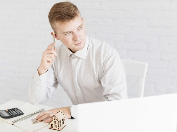 thoughtful-handsome-realtor-office_optimized