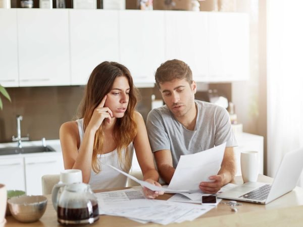 young-couple-checking-their-family-budget_optimized